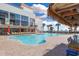 Large outdoor pool area surrounded by chairs with an ocean view at 7200 N Ocean Blvd. # 459, Myrtle Beach, SC 29572