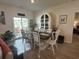 Bright dining room with large table, sliding glass doors leading to the patio at 8164 Forest Edge Dr., Myrtle Beach, SC 29579