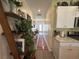 Hallway with modern flooring and neutral paint, leading to the bedrooms at 8164 Forest Edge Dr., Myrtle Beach, SC 29579