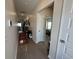 Hallway with modern flooring and neutral paint, leading to the bedrooms at 8164 Forest Edge Dr., Myrtle Beach, SC 29579