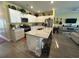 Spacious kitchen featuring a large island, stainless steel appliances, and ample cabinet space at 8164 Forest Edge Dr., Myrtle Beach, SC 29579
