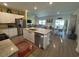 Open-concept kitchen with granite countertops, stainless steel appliances, and island at 8164 Forest Edge Dr., Myrtle Beach, SC 29579