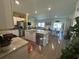 Open-concept kitchen with granite countertops, stainless steel appliances, and island at 8164 Forest Edge Dr., Myrtle Beach, SC 29579