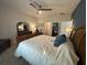 Cozy main bedroom featuring a comfortable bed, dresser, and stylish decor at 8164 Forest Edge Dr., Myrtle Beach, SC 29579