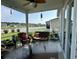 Cozy screened porch with comfortable seating, perfect for outdoor relaxation at 8164 Forest Edge Dr., Myrtle Beach, SC 29579