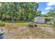 Fenced backyard features a detached garage, storage shed, and a stone picnic table at 823 Bellamy Ave., Murrells Inlet, SC 29576