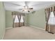 Neutral bedroom featuring wall-to-wall carpet, a ceiling fan, and curtains at 823 Bellamy Ave., Murrells Inlet, SC 29576
