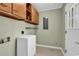 Functional laundry area with storage cabinets at 823 Bellamy Ave., Murrells Inlet, SC 29576