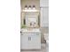 Bathroom featuring white cabinets, marble countertops, and gold plumbing fixtures at 8468 Duke Pl. # 28, Myrtle Beach, SC 29572