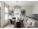 Bright dining nook featuring a banquette with a modern chandelier and neutral color palette at 8468 Duke Pl. # 28, Myrtle Beach, SC 29572
