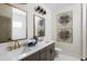 Elegant bathroom with dual sinks, white marble countertops, and stylish gold fixtures at 8470 Duke Pl. # 29, Myrtle Beach, SC 29572