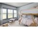 Charming bedroom with bunk beds, a play area, and large windows at 8470 Duke Pl. # 29, Myrtle Beach, SC 29572