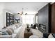 Stylish living room with a modern fireplace, sleek shelving, and comfortable seating area at 8470 Duke Pl. # 29, Myrtle Beach, SC 29572