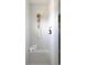 Elegant shower with white marble tile, gold shower head, and built-in shampoo niche at 8470 Duke Pl. # 29, Myrtle Beach, SC 29572