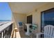 Relax on the balcony with beach views at 912 N Waccamaw Dr. # 202, Garden City Beach, SC 29576