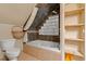 Bathroom with a jetted tub, glass block window, toilet, and built-in shelves at 938 Fox Hollow Rd., Conway, SC 29526