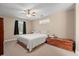 Cozy bedroom featuring neutral walls, ceiling fan, carpet flooring, and a window providing natural light at 938 Fox Hollow Rd., Conway, SC 29526