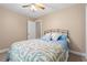 Cozy bedroom featuring a ceiling fan, and a door leading to other rooms at 938 Fox Hollow Rd., Conway, SC 29526