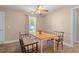 Cozy dining area with lots of natural light from the window with adjoining Kitchen at 938 Fox Hollow Rd., Conway, SC 29526