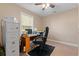 Home office with a desk, filing cabinet, and plenty of natural light at 938 Fox Hollow Rd., Conway, SC 29526