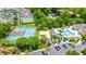 An aerial view of the tennis courts, sand volleyball court, pool and surrounding complex and parking at 9755 Leyland Dr. # 2, Myrtle Beach, SC 29572