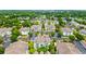 Aerial view of a well-maintained community featuring multiple buildings, lush greenery, and ample parking at 9755 Leyland Dr. # 2, Myrtle Beach, SC 29572