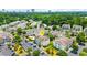 Overhead view of a condo complex with beautiful landscaping, parking, and bright blue awnings at 9755 Leyland Dr. # 2, Myrtle Beach, SC 29572