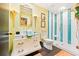 Bright and uniquely decorated bathroom featuring modern fixtures, a glass shower, and stylish tile work at 9755 Leyland Dr. # 2, Myrtle Beach, SC 29572