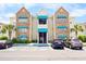 Apartment complex featuring covered balconies, parking, and blue awnings adding a pop of color at 9755 Leyland Dr. # 2, Myrtle Beach, SC 29572