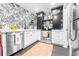 Charming kitchen featuring stainless steel appliances, white cabinets, and modern finishes at 9755 Leyland Dr. # 2, Myrtle Beach, SC 29572