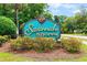 Savannah Shores sign with lush landscaping, marking the entrance to the community at 9755 Leyland Dr. # 2, Myrtle Beach, SC 29572