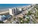Aerial view showcasing the condo's proximity to beach, nearby streets, and landscaping at 1003 S Ocean Blvd. # 802, North Myrtle Beach, SC 29582