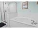 Bathroom featuring a glass enclosed shower and a jacuzzi tub with crystal handles at 1003 S Ocean Blvd. # 802, North Myrtle Beach, SC 29582