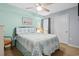 Charming bedroom with blue and white accents, featuring a comfortable queen size bed at 1003 S Ocean Blvd. # 802, North Myrtle Beach, SC 29582