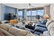 Comfortable living room with balcony access and stunning ocean views at 1003 S Ocean Blvd. # 802, North Myrtle Beach, SC 29582