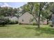 Spacious backyard featuring a lush lawn, mature trees, and surrounding homes at 1024 Palmetto St., Georgetown, SC 29440