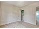 Bedroom featuring floral wallpaper, closet, and doorway to other room at 1024 Palmetto St., Georgetown, SC 29440