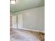 A well-lit bedroom featuring neutral walls, carpeted floors, and white trim and doors at 1024 Palmetto St., Georgetown, SC 29440