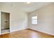 The bedroom features hardwood flooring and an alcove with a shelf at 1024 Palmetto St., Georgetown, SC 29440
