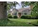 Attractive single-story home with a well-kept lawn and mature tree, exuding charm and curb appeal at 1024 Palmetto St., Georgetown, SC 29440