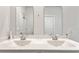 Bathroom with double vanity sink and a large mirror at 1074 Sennema Circle, Myrtle Beach, SC 29588