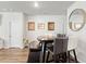 Dining room with dark wood floors and a round table at 1074 Sennema Circle, Myrtle Beach, SC 29588