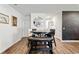 Dining room with dark wood floors, table, and a decorative mirror at 1074 Sennema Circle, Myrtle Beach, SC 29588