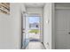 View from inside, looking through the front door out to the front yard at 1074 Sennema Circle, Myrtle Beach, SC 29588