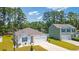 View of house showing landscaped front yard, driveway, and view of neighboring home at 1074 Sennema Circle, Myrtle Beach, SC 29588