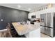 Kitchen island with granite countertops and stainless steel appliances at 1074 Sennema Circle, Myrtle Beach, SC 29588