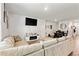 Spacious living room featuring modern furnishings, including a sectional couch and dining table at 1074 Sennema Circle, Myrtle Beach, SC 29588
