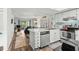 Bright kitchen features stainless steel appliances, ample cabinetry, and a spacious breakfast bar overlooking the living area at 1101 2Nd Ave. N # 1501, Surfside Beach, SC 29575