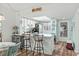 Eat-in kitchen with breakfast bar, white cabinets, modern appliances and lots of natural light at 1101 2Nd Ave. N # 1501, Surfside Beach, SC 29575