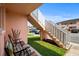 Relaxing outdoor seating area with shade from the stairs leading to upper level condos at 1101 2Nd Ave. N # 1501, Surfside Beach, SC 29575